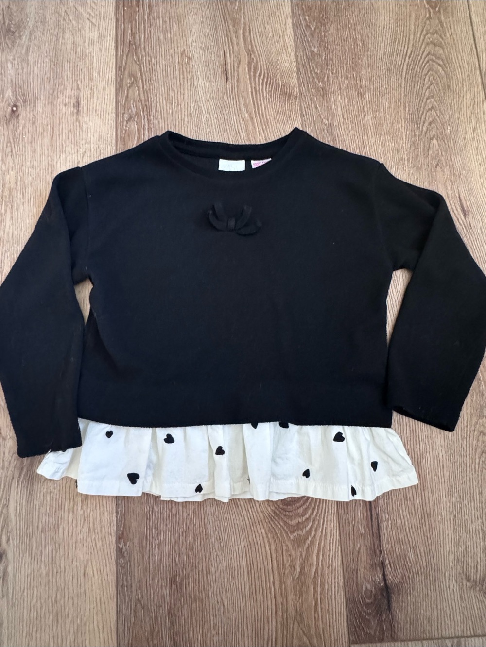 Zara Black Pullover with White Heart-Ruffle Hem